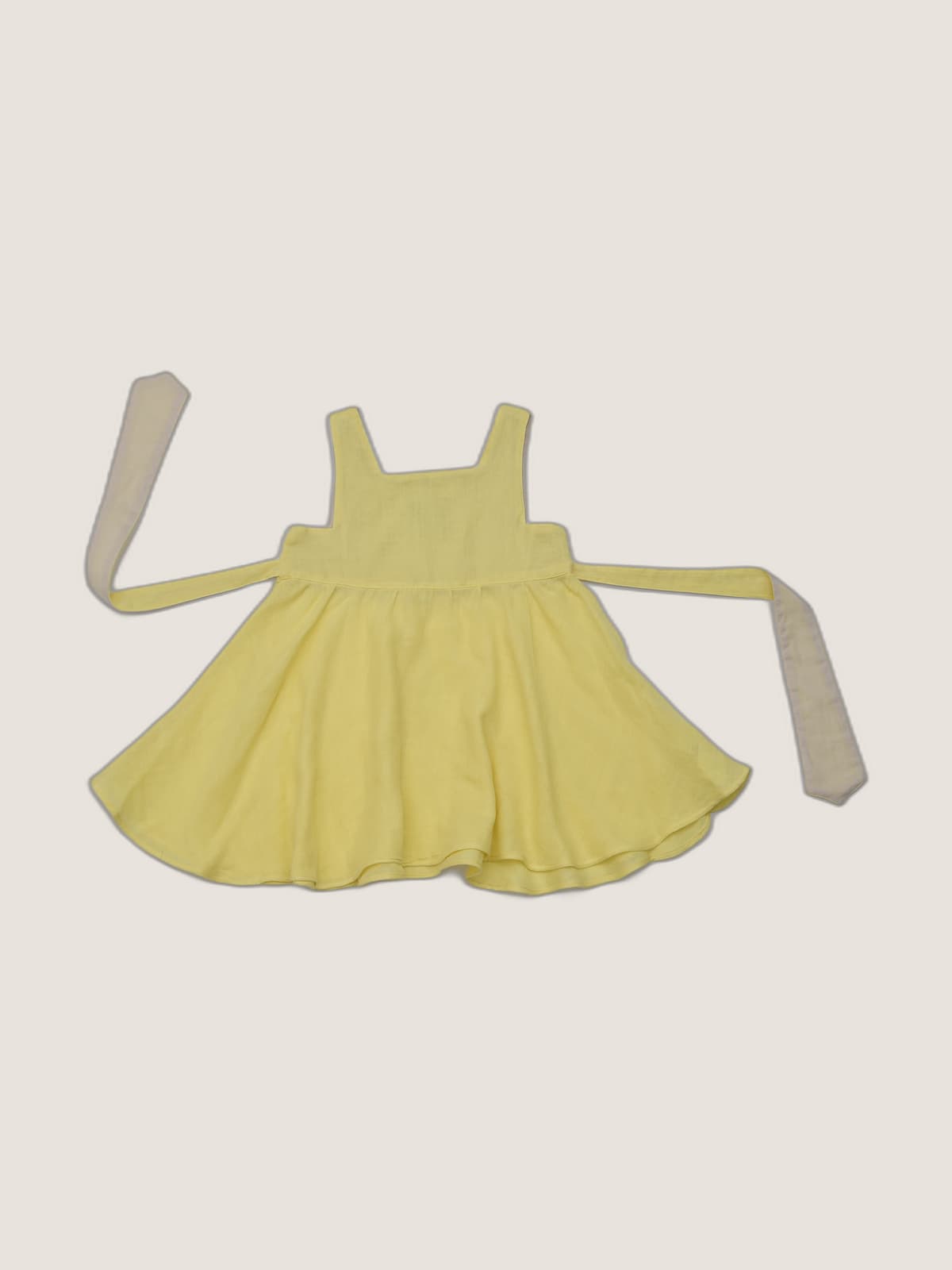 Abito Charlotte smanicato in mussola Giallo e ocra still life front di Farway Milano - _AND3891-vertical-beige-centrato-zoom.jpg