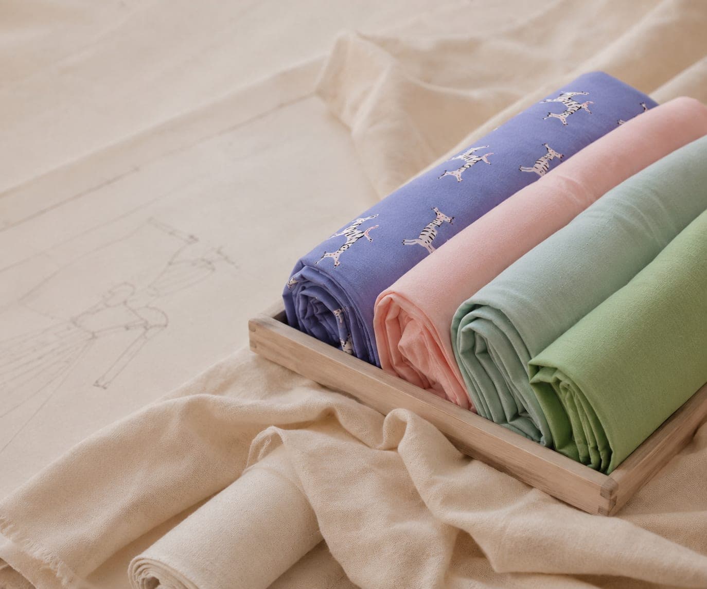 Fabrics and sketches in the Farway Milano atelier